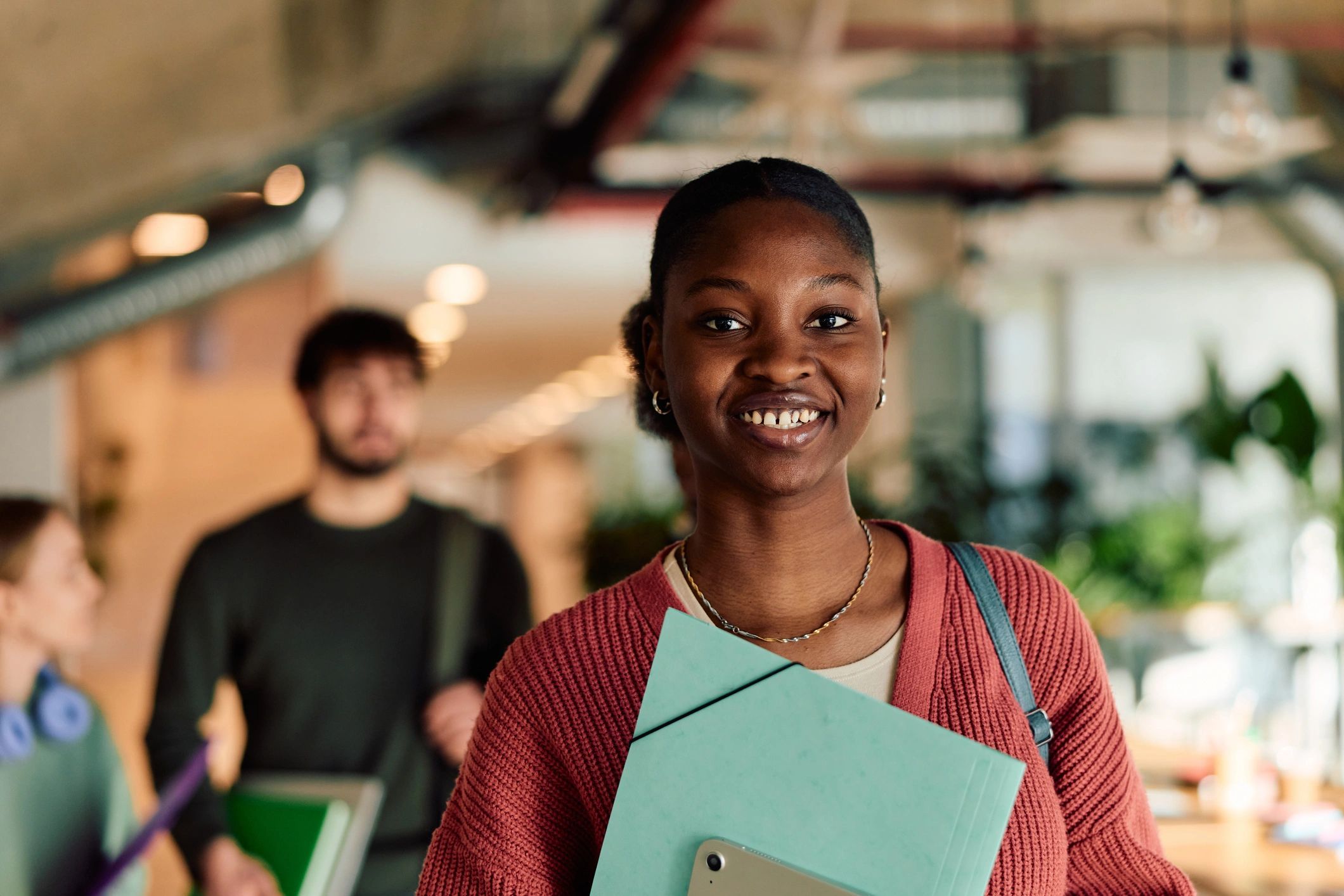 Portrait subject smiling during a bright lifestyle photography session